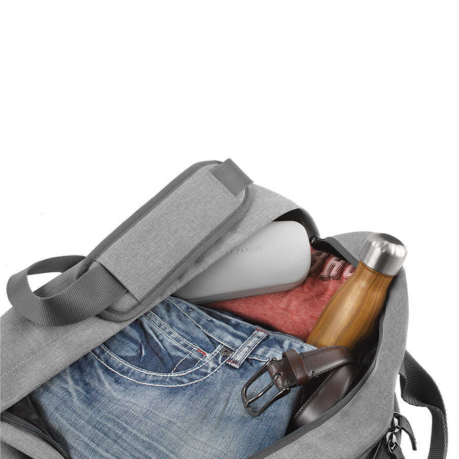 top view of Solo Re:move Duffel packed with clothing and accessories