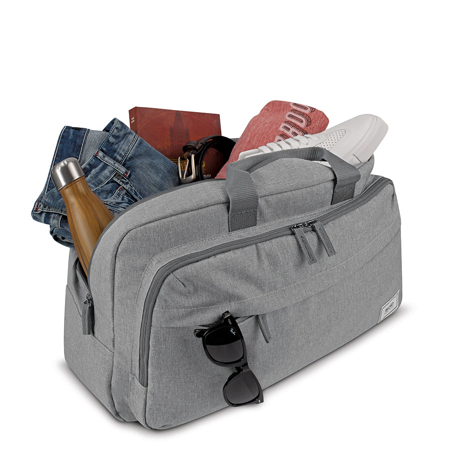 Solo Re:move Duffel packed with clothing and accessories 