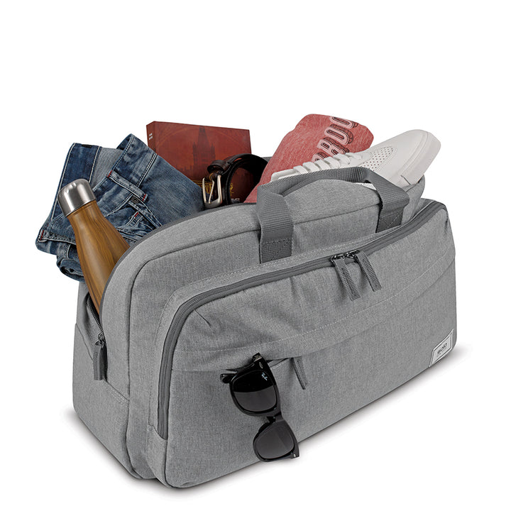 Solo Re:move Duffel packed with clothing and accessories