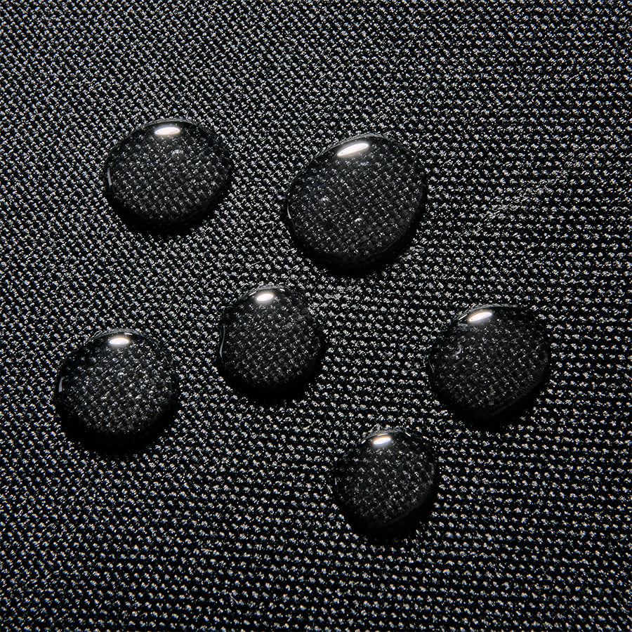 water beading off black recycled material used on Solo Re:define backpack 