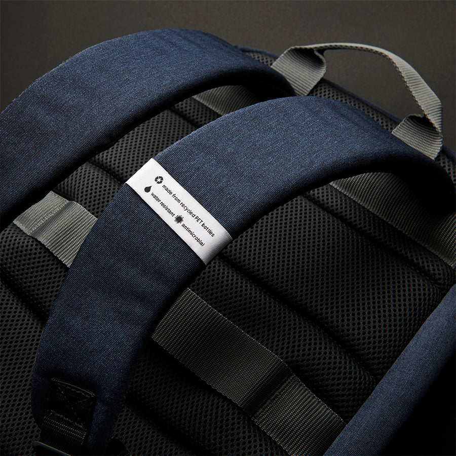 close up of straps on Solo Re:cover Backpack in navy