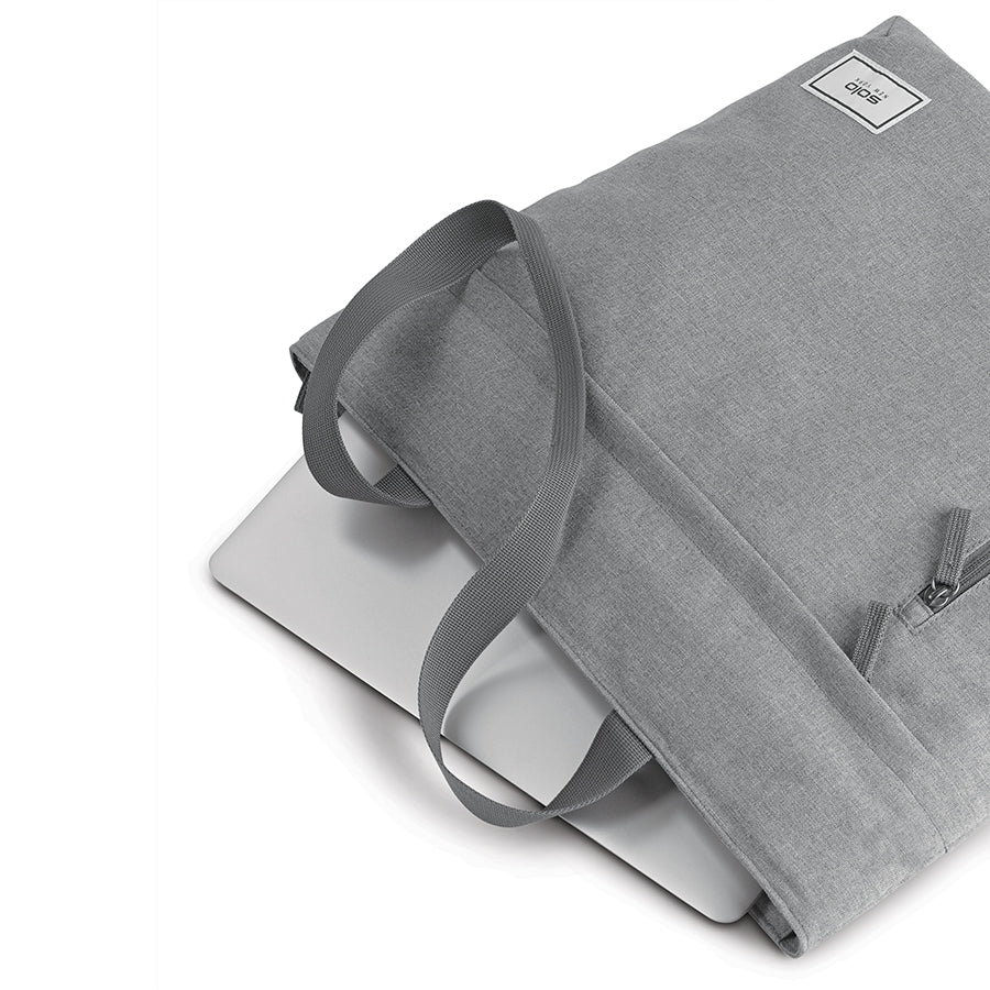 Solo Re:store Tote in grey laying flat with computer inside