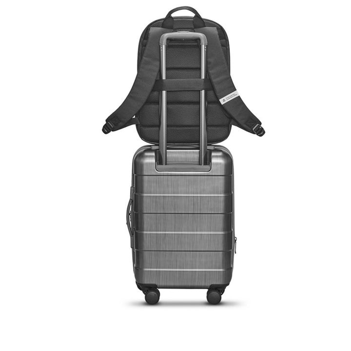 Solo Re:serve Carry-On Spinner suitcase with Solo backpack attached to luggage handle