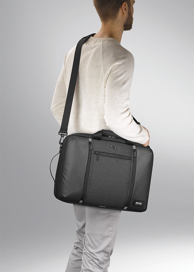 Premium Photo | A man carries a bag briefcase goes to work in the office in  a business suit