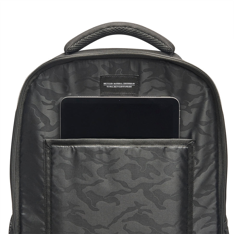 view showing open middle pocket of Solo Re:define backpack in black