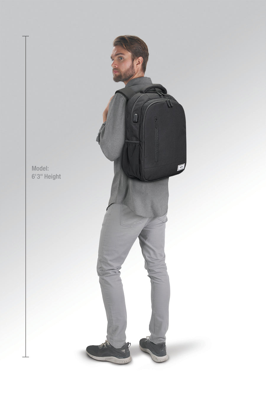 model wearing Solo Re:define backpack in black