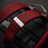 close up of back straps on Solo Re:cover Backpack in red