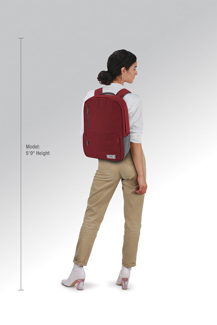 model wearing Solo Re:cover Backpack in red