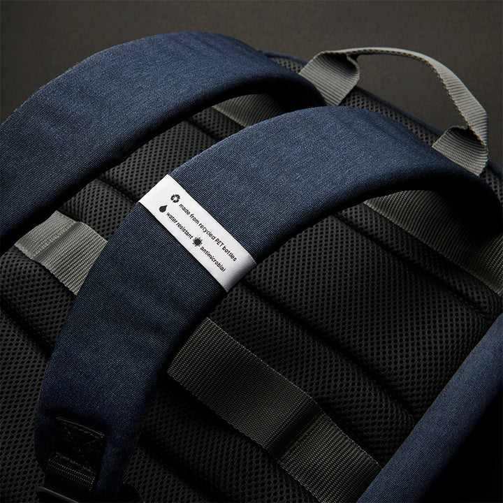 close up of straps on Solo Re:cover Backpack in navy