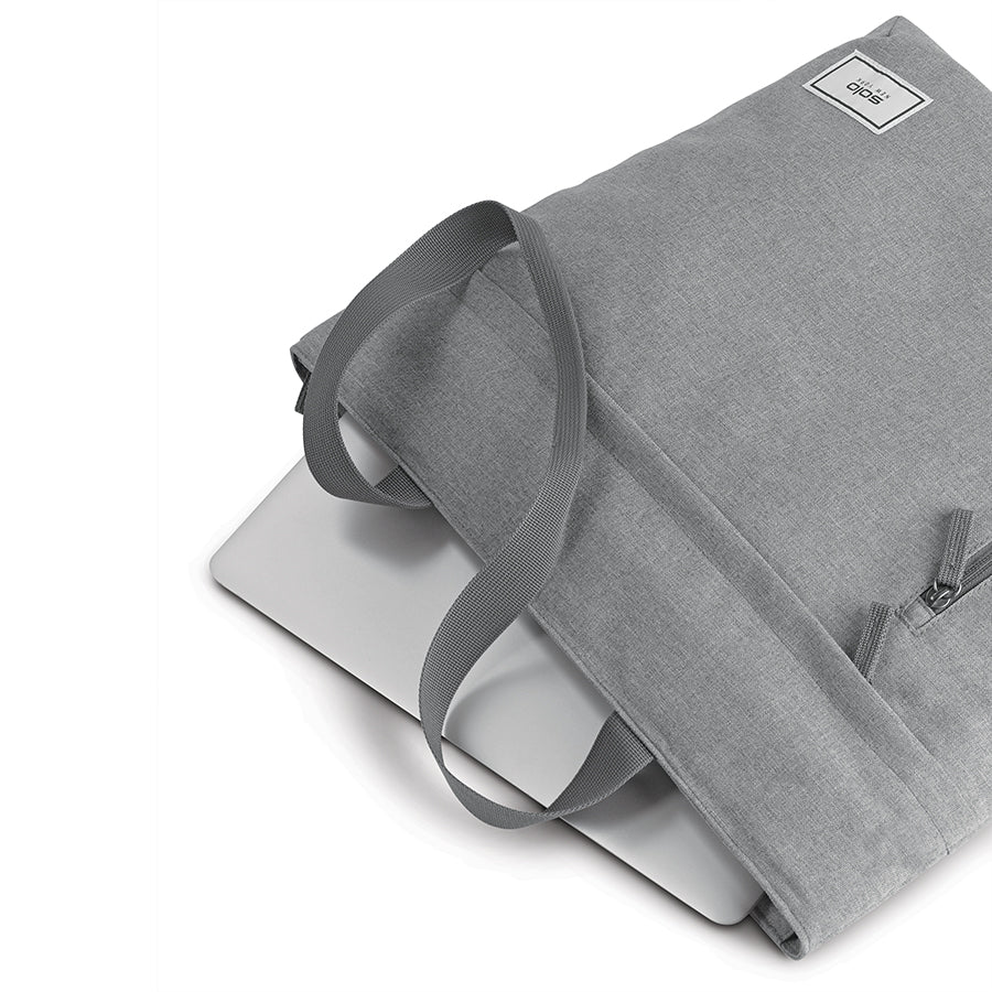 Solo Re:store Tote in grey laying flat with computer inside 
