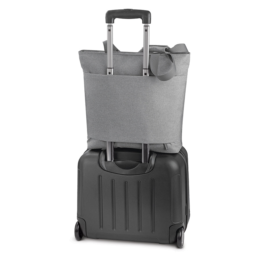 Solo Re:store Tote in grey attached to black suitcase handle