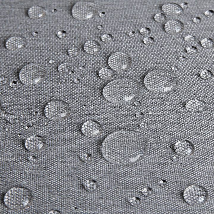 water beading off grey recycled material used to construct Solo Re:treat Carry-on suitcase